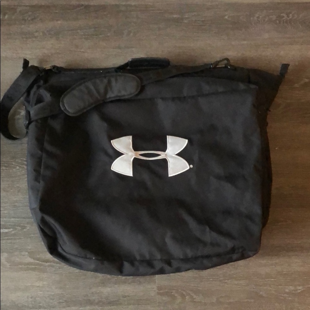 Under Armour Suit and duffle travel bag